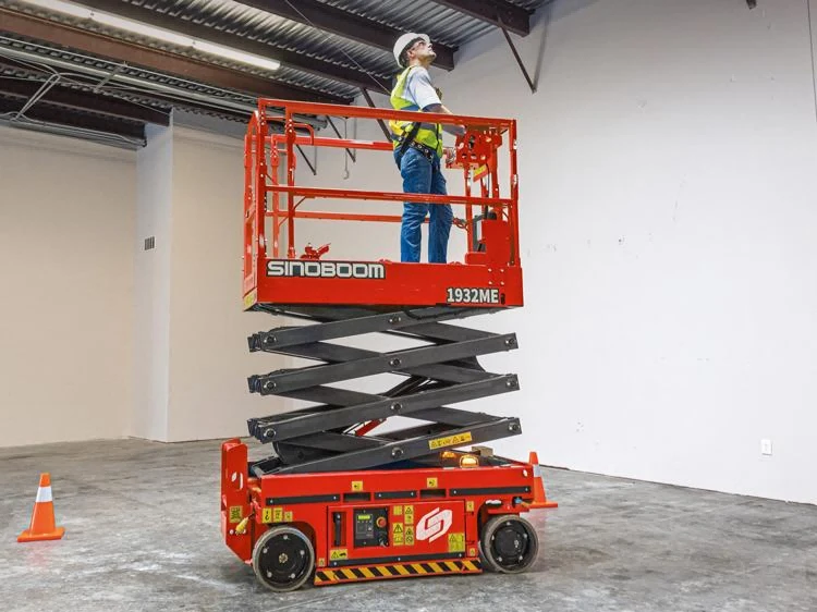 OSHA compliant aerial work platform scissor lift operating safely at height with updated lithium battery system and proper fall protection OSHA compliant aerial work platform scissor lift operating safely at height with updated lithium battery system and proper fall protection